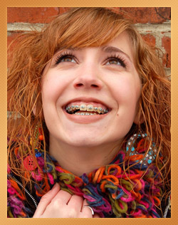 teen girl wearing braces and smiling
